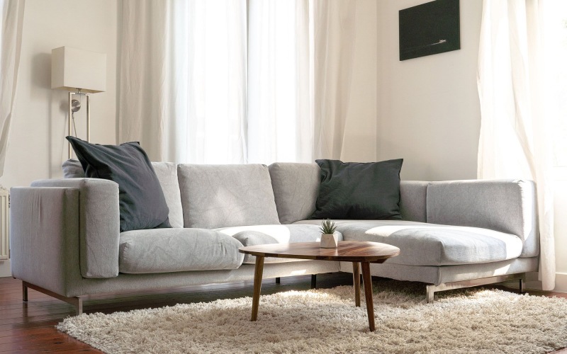 a living room with a couch and a coffee table